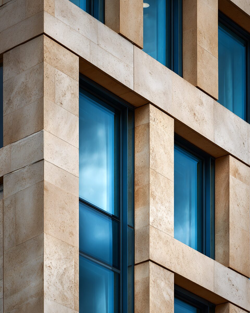 Close architectural detail of a UK commercial building facade, used by Clean Contracts UK to introduce why most commercial cleaning contracts go unreviewed.
